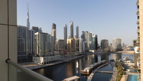 Prime Spacious 2 BR Apt, Burj Khalifa & Canal View - Scala Tower